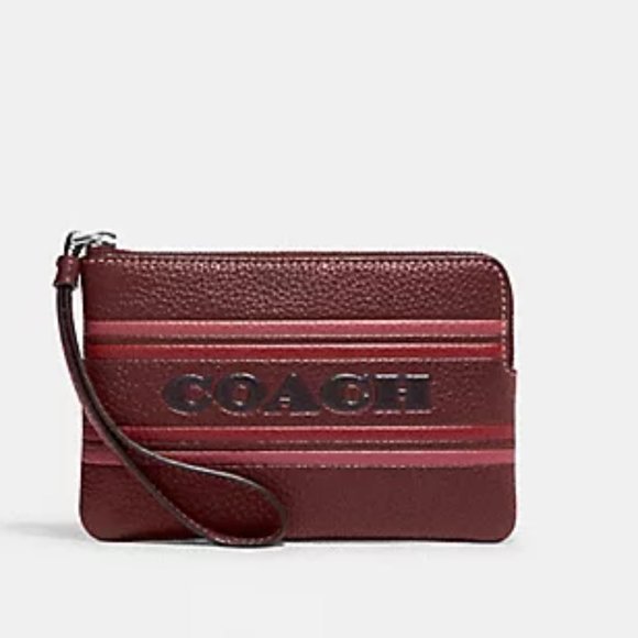 Coach Handbags - Coach Corner Zip Wristlet with Coach Stripe